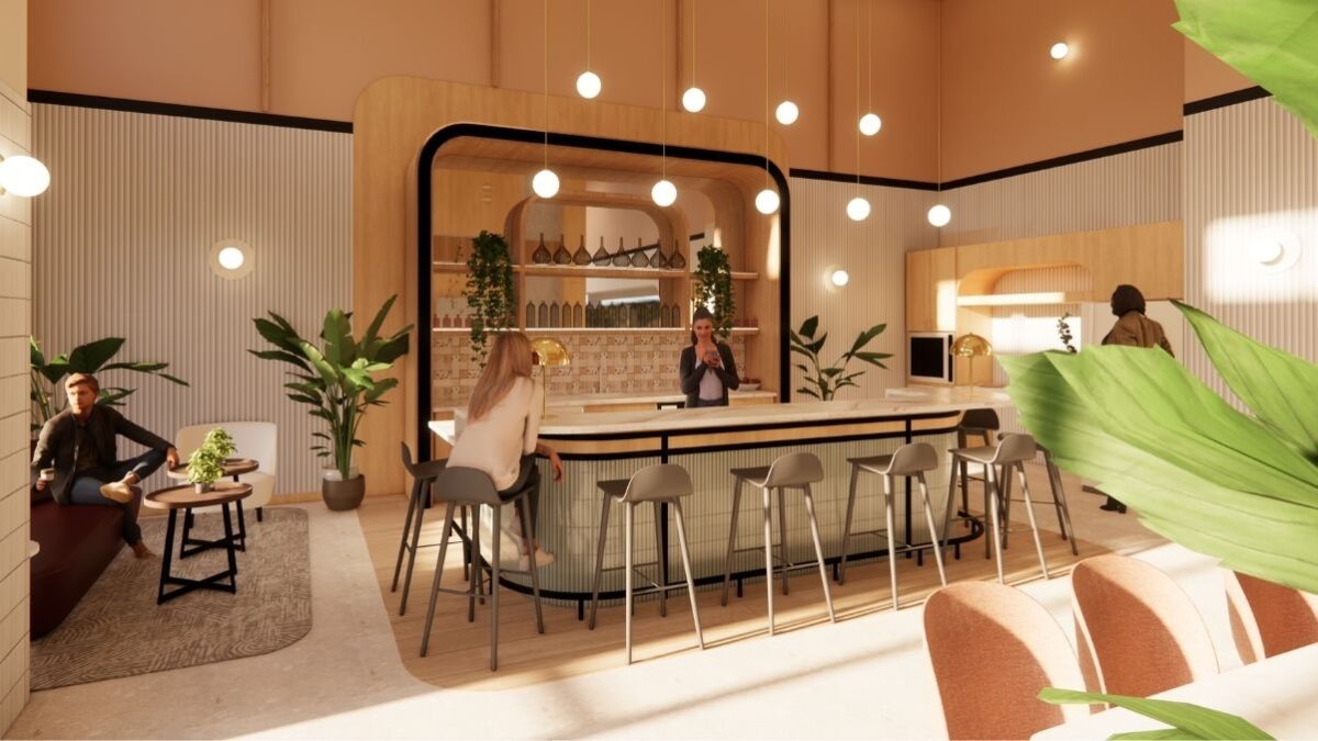 Multifamily amenity lounge with bar, pendant lighting, bar seating, and indoor plants