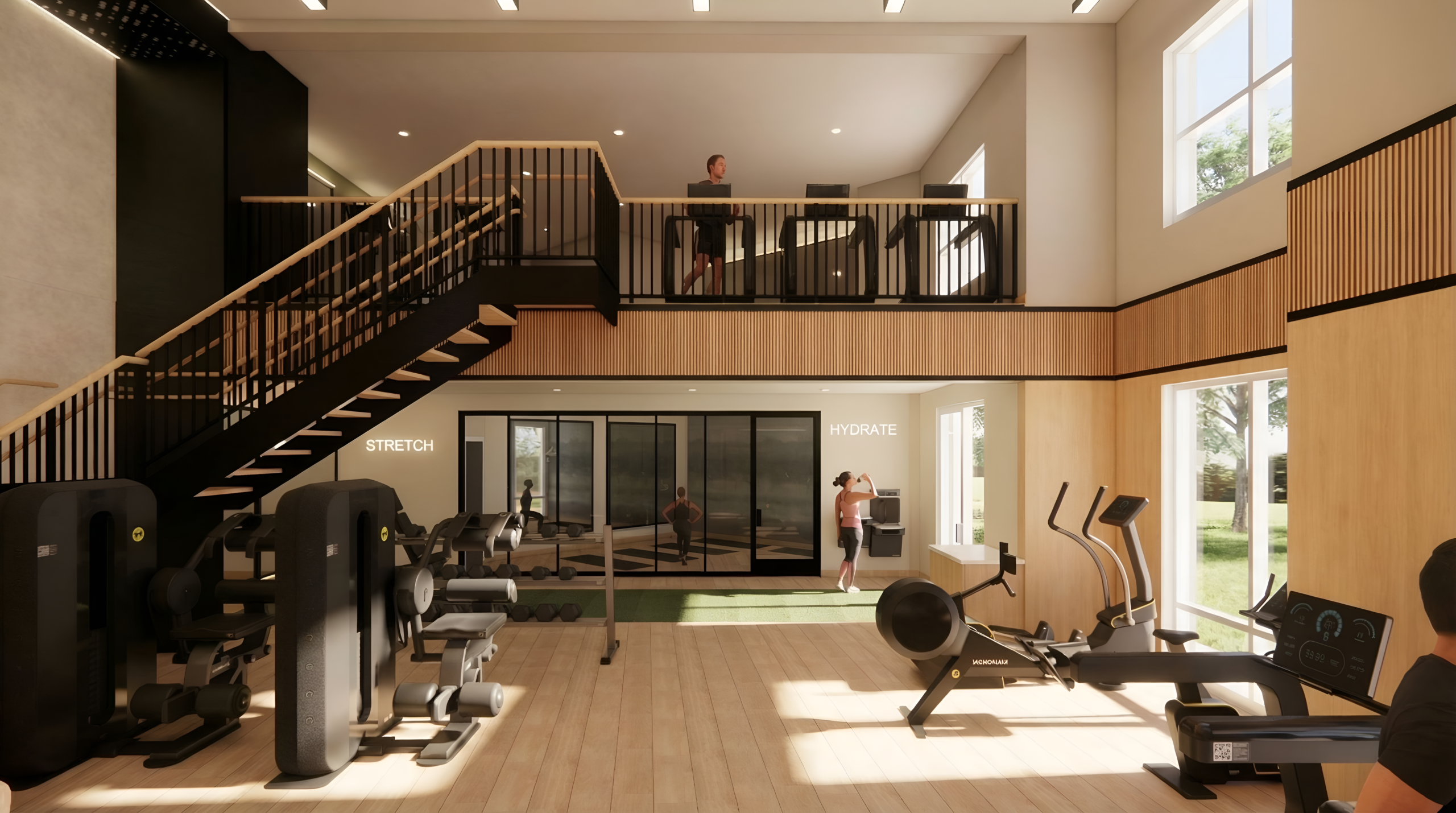Two-story apartment fitness center with cardio equipment, strength machines, stretch studio, and hydration station