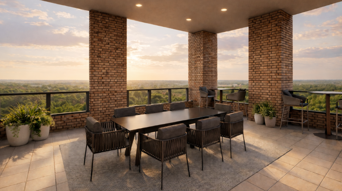 Bolden covered outdoor dining area at The Boro Tysons VA with long table, chairs and pergola