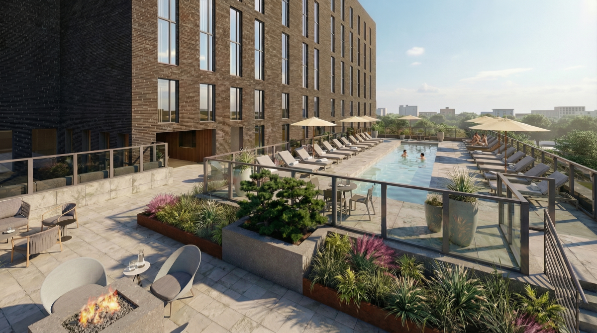 Rise rooftop pool deck aerial view at The Boro Tysons VA with pool, lounge chairs, umbrellas and planters”